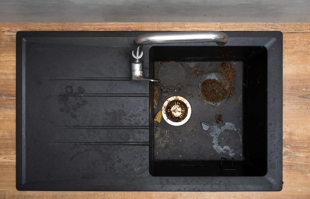 dirty granite kitchen sink