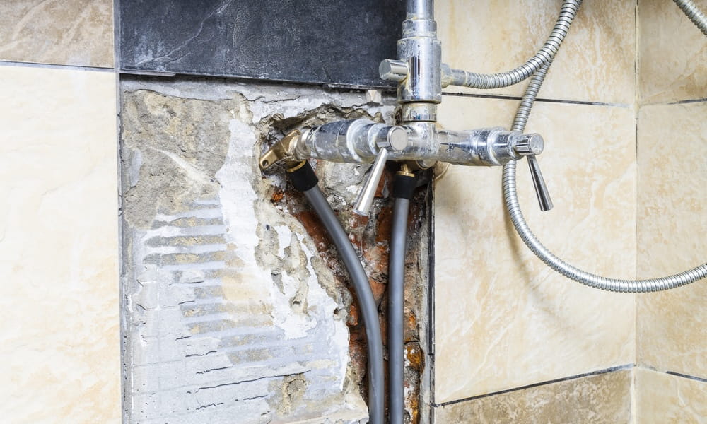 leaky water pipes connected to faucet